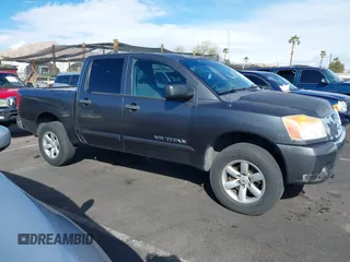 2010 Nissan Titan XE with VIN 1N6BA0EJ5AN304045, listed as a IAAI auction lot 41794718 with 297,551 mi miles. Bid and sale history available at carsss.com. Image 13.