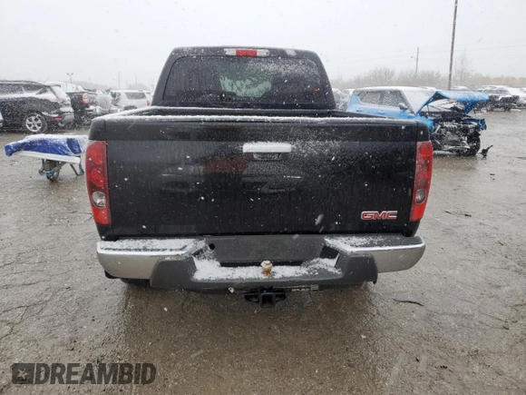 2011 GMC Canyon SLE1 z VIN 1GTH6MFE6B8141218, wystawiony jako Copart lot #81897704 z przebiegiem 233 039 mil mil oraz Szkoda całkowita • Salvage title. Historia ofert i sprzedaży dostępna na DreamBid. Obrazek 6.