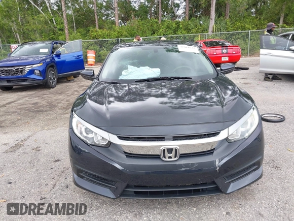 2016 Honda Civic Sedan LX with VIN 19XFC2F52GE069998, listed as a IAAI auction lot 42016233 with 93,990 mi miles. Bid and sale history available at carsss.com. Image 6.