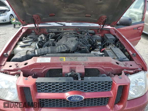 2004 Ford Explorer Sport Trac XLS with VIN 1FMDU77K74UC12586, listed as a Copart auction lot 61240815 with 96,377 mi miles and Salvage title. Bid and sale history available at DreamBid. Image 12.