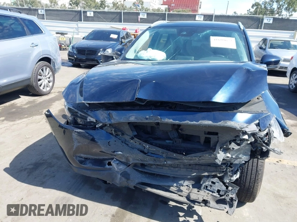 2020 Mazda CX-5 Grand Touring with VIN JM3KFADM6L1830093, listed as a IAAI auction lot 41699672 with 66,769 mi miles. Bid and sale history available at carsss.com. Image 6.