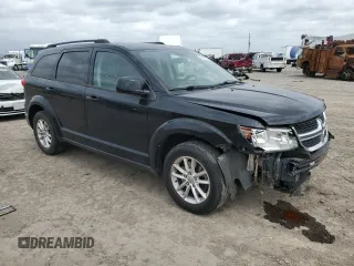2015 Dodge Journey SXT with VIN 3C4PDCBG9FT690910, listed as a Copart auction lot 48195875 with 110,489 mi miles and Salvage Title. Bid and sale history available at DreamBid. Image 4.