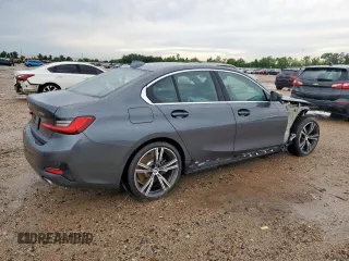 2021 BMW 3 Series 330i with VIN 3MW5R1J08M8B48101, listed as a Copart auction lot 57802525 with 47,604 mi miles and Salvage title. Bid and sale history available at DreamBid. Image 3.