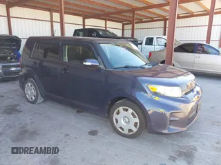 2012 Scion xB with VIN JTLZE4FE0CJ024692, listed as a IAAI auction lot 41844965 with 228,098 mi miles. Bid and sale history available at carsss.com. Image 1.