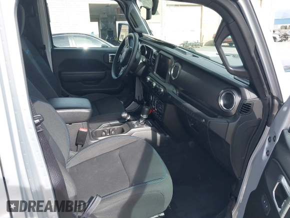 2023 Jeep Wrangler Rubicon with VIN 1C4JJXR69PW581474, listed as a IAAI auction lot 41697016 with 25,775 mi miles and . Bid and sale history available at DreamBid. Image 5.