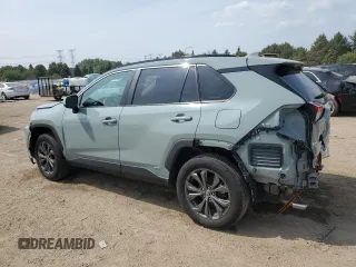 2022 Toyota RAV4 Hybrid XLE Premium with VIN 4T3B6RFV8NU101319, listed as a Copart auction lot 60987535 with 100,070 mi miles and Salvage title. Bid and sale history available at DreamBid. Image 2.
