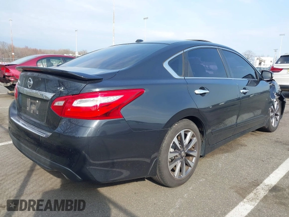 2016 Nissan Altima SR with VIN 1N4AL3AP3GC292783, listed as a IAAI auction lot 41876267 with 128,013 mi miles and . Bid and sale history available at carsss.com. Image 4.