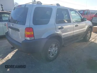 2002 Ford Escape XLT Choice with VIN 1FMYU04112KB96320, listed as a IAAI auction lot 41700476 with 236,832 mi miles. Bid and sale history available at carsss.com. Image 4.