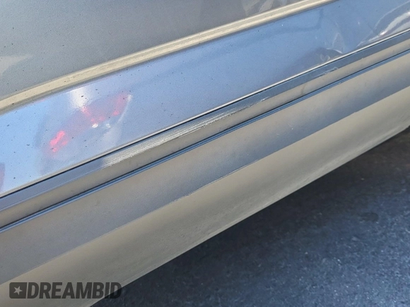 2023 Volkswagen Atlas SE z VIN 1V2HR2CA5PC526012, wystawiony jako IAAI lot #42796408 z przebiegiem 41 216 mil mil oraz . Historia ofert i sprzedaży dostępna na DreamBid. Obrazek 39.