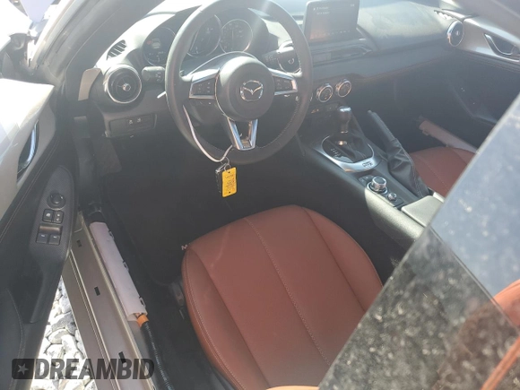 2023 Mazda MX-5 Miata Grand Touring z VIN JM1NDAM70P0551336, wystawiony jako Copart lot #54984385 z przebiegiem 10 948 mil mil oraz Szkoda całkowita • Salvage title. Historia ofert i sprzedaży dostępna na DreamBid. Obrazek 8.