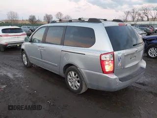 2007 Kia Sedona LX with VIN KNDMB233976172127, listed as a IAAI auction lot 41557356 with 164,383 mi miles. Bid and sale history available at carsss.com. Image 3.