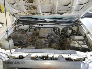 2013 Toyota Tacoma z VIN 5TFPX4EN6DX015170, wystawiony jako Copart lot #50858535 z przebiegiem 144 378 mil mil oraz Szkoda całkowita • Salvage title. Historia ofert i sprzedaży dostępna na DreamBid. Obrazek 12.