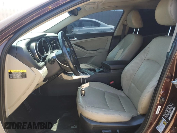 2014 Kia Optima EX with VIN 5XXGN4A79EG329448, listed as a Copart auction lot 50991095 with 103,879 mi miles and Salvage Title. Bid and sale history available at carsss.com. Image 7.