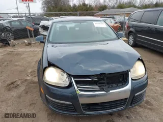 2006 Volkswagen Jetta Sedan 1.9L TDI with VIN 3VWST71K56M032034, listed as a IAAI auction lot 41498486 with 137,573 mi miles. Bid and sale history available at carsss.com. Image 12.