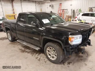 2015 GMC Sierra 1500 SLE with VIN 1GTV2UEC7FZ375124, listed as a IAAI auction lot 41479589 with 144,705 mi miles. Bid and sale history available at carsss.com. Image 1.