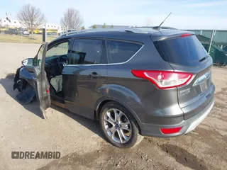 2015 Ford Escape Titanium with VIN 1FMCU9J90FUB58306, listed as a IAAI auction lot 41815151 with 136,835 mi miles. Bid and sale history available at carsss.com. Image 3.