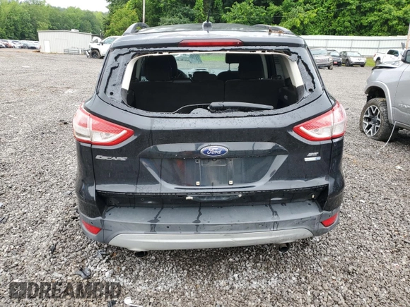 2014 Ford Escape SE with VIN 1FMCU9GX7EUB52765, listed as a Copart auction lot 57563305 with 187,203 mi miles and Salvage title. Bid and sale history available at DreamBid. Image 6.