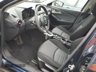 2018 Mazda CX-3 Sport z VIN JM1DKFB79J1323497, wystawiony jako Copart lot #56168875 z przebiegiem 60 284 mil mil oraz Szkoda całkowita • Salvage title. Historia ofert i sprzedaży dostępna na DreamBid. Obrazek 7.
