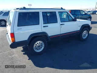 1996 Jeep Cherokee Sport with VIN 1J4FJ68S9TL234764, listed as a IAAI auction lot 41636731 with 129,732 mi miles. Bid and sale history available at carsss.com. Image 4.