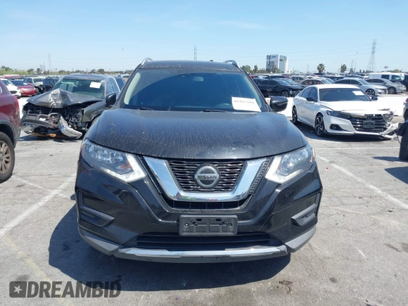2019 Nissan Rogue SV with VIN KNMAT2MT8KP506083, listed as a IAAI auction lot 41965304 with 99,872 mi miles and . Bid and sale history available at DreamBid. Image 13.