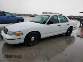 1999 Ford Crown Victoria Police z VIN 2FAFP71W6XX179647, wystawiony jako Copart lot #55151945 z przebiegiem 124 558 mil mil oraz Tytuł czysty. Historia ofert i sprzedaży dostępna na DreamBid. Obrazek 1.