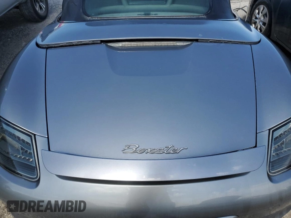 2005 Porsche Boxster с VIN WP0CA29875U711919, выставлен на аукционе Copart как лот 74299934 с пробегом Не указан миль и На запчасти • Non repairable. История ставок и продаж доступна на DreamBid. Изображение 11.