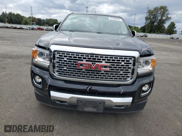 2020 GMC Canyon 4WD Denali with VIN 1GTG6EEN0L1243031, listed as a Copart auction lot 67939014 with 106,294 mi miles and Salvage Title. Bid and sale history available at carsss.com. Image 5.