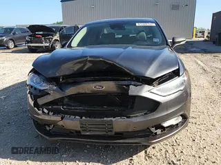 2017 Ford Fusion Titanium z VIN 3FA6P0D96HR251752, wystawiony jako Copart lot #61568705 z przebiegiem 173 479 mil mil oraz Nie do naprawy • Non repairable. Historia ofert i sprzedaży dostępna na DreamBid. Obrazek 14.