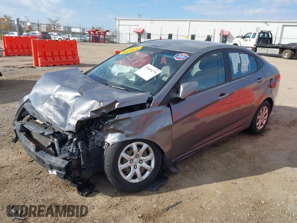2014 Hyundai Accent GLS with VIN KMHCT4AE9EU614191, listed as a IAAI auction lot 37899279 with 144,247 mi miles. Bid and sale history available at carsss.com. Image 2.