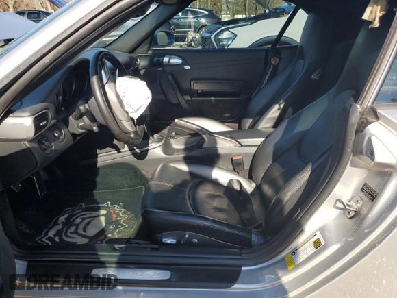 2008 Porsche 911 Carrera S z VIN WP0CB29998S776812, wystawiony jako Copart lot #86967074 z przebiegiem Nie podano mil oraz Szkoda całkowita • Salvage title. Historia ofert i sprzedaży dostępna na DreamBid. Obrazek 7.