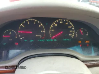 1999 Cadillac Seville Touring STS z VIN 1G6KY5496XU926352, wystawiony jako Copart lot #74711014 z przebiegiem 140 915 mil mil oraz Nie do naprawy • Non repairable. Historia ofert i sprzedaży dostępna na DreamBid. Obrazek 9.