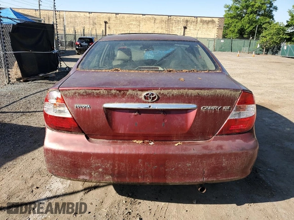 2004 Toyota Camry LE z VIN 4T1BE30K44U299631, wystawiony jako Copart lot #53949745 z przebiegiem 247 444 mil mil oraz Szkoda całkowita • Salvage title. Historia ofert i sprzedaży dostępna na DreamBid. Obrazek 6.