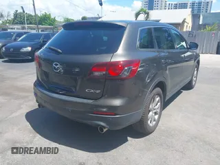 2015 Mazda CX-9 Touring z VIN JM3TB2CV1F0458995, wystawiony jako IAAI lot #42523344 z przebiegiem 130 763 mil mil oraz . Historia ofert i sprzedaży dostępna na DreamBid. Obrazek 4.