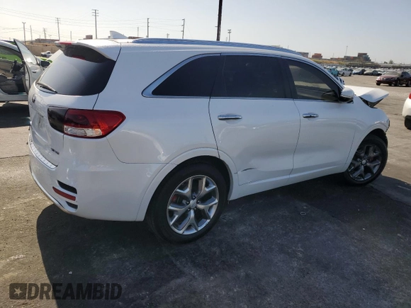 2017 Kia Sorento SXL z VIN 5XYPK4A54HG250891, wystawiony jako Copart lot #57791565 z przebiegiem Nie podano mil oraz Szkoda całkowita • Salvage title. Historia ofert i sprzedaży dostępna na DreamBid. Obrazek 3.