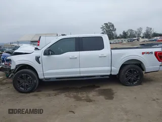 2022 Ford F-150 XL with VIN 1FTFW1E57NKE14424, listed as a IAAI auction lot 42097712 with 56,879 mi miles and . Bid and sale history available at DreamBid. Image 14.