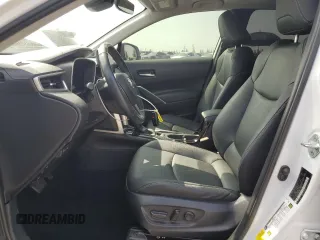 2023 Toyota Corolla Cross XLE with VIN 7MUDAAAG2PV042957, listed as a Copart auction lot 60301555 with 39,211 mi miles and Salvage title. Bid and sale history available at DreamBid. Image 7.