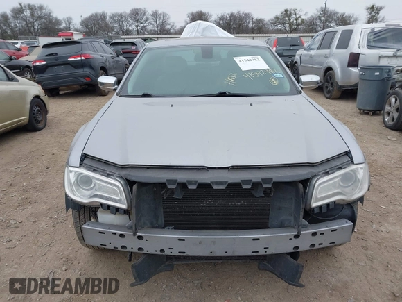 2015 Chrysler 300 C with VIN 2C3CCAEG0FH779540, listed as a IAAI auction lot 41542982 with 211,348 mi miles and . Bid and sale history available at carsss.com. Image 12.