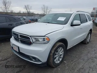 2015 Dodge Durango SXT with VIN 1C4RDJAG4FC760713, listed as a IAAI auction lot 41707354 with 174,216 mi miles and . Bid and sale history available at carsss.com. Image 2.