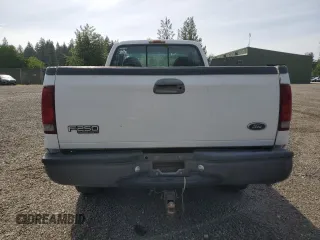 1999 Ford F-250 XL with VIN 1FTNF21F3XEC38845, listed as a Copart auction lot 60869825 with 327,518 mi miles and Clean title. Bid and sale history available at DreamBid. Image 6.