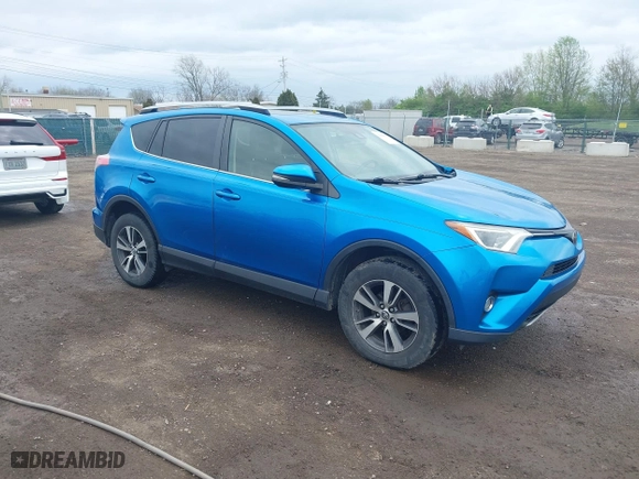 2017 Toyota RAV4 XLE with VIN JTMRFREV4HJ123496, listed as a IAAI auction lot 42068817 with 211,682 mi miles. Bid and sale history available at carsss.com. Image 1.