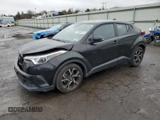 2019 Toyota C-HR XLE z VIN NMTKHMBX7KR094833, wystawiony jako Copart lot #52406575 z przebiegiem 54 565 mil mil oraz Szkoda całkowita • Salvage title. Historia ofert i sprzedaży dostępna na DreamBid. Obrazek 1.