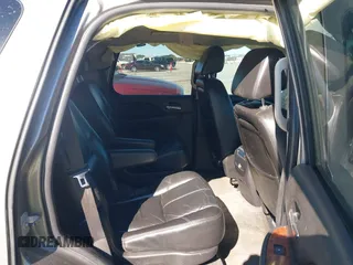 2007 Chevrolet Tahoe LTZ with VIN 1GNFC13J97R155705, listed as a IAAI auction lot 40914171 with 165,727 mi miles and . Bid and sale history available at DreamBid. Image 8.