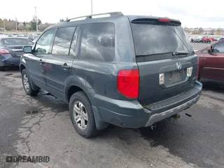 2003 Honda Pilot EX with VIN 2HKYF18573H589899, listed as a IAAI auction lot 41917543 with 211,123 mi miles. Bid and sale history available at carsss.com. Image 3.