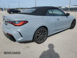2022 BMW 4 Series M440i with VIN WBA53AT00NCK09742, listed as a Copart auction lot 42662415 with Not provided miles and Salvage title. Bid and sale history available at DreamBid. Image 3.