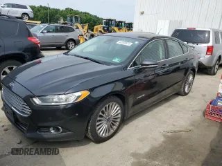 2014 Ford Fusion Titanium Hybrid with VIN 3FA6P0RU3ER324343, listed as a Copart auction lot 63350874 with 241,011 mi miles and Clean title. Bid and sale history available at DreamBid. Image 1.