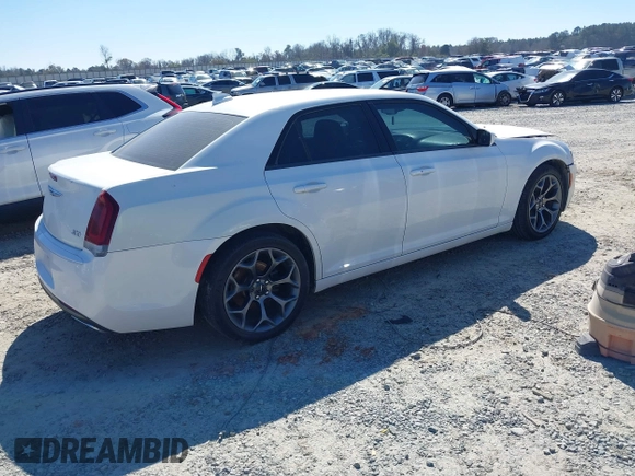 2015 Chrysler 300 with VIN 2C3CCABG9FH736013, listed as a IAAI auction lot 41646979 with 103,572 mi miles. Bid and sale history available at carsss.com. Image 4.