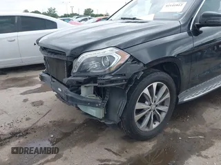 2014 Mercedes-Benz GL 450 with VIN 4JGDF7CE0EA372225, listed as a IAAI auction lot 42141012 with 158,045 mi miles and . Bid and sale history available at DreamBid. Image 6.