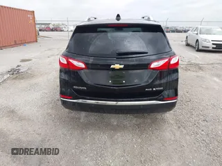 2018 Chevrolet Equinox Premier with VIN 2GNAXVEV7J6275379, listed as a IAAI auction lot 41949962 with 149,329 mi miles and . Bid and sale history available at DreamBid. Image 16.