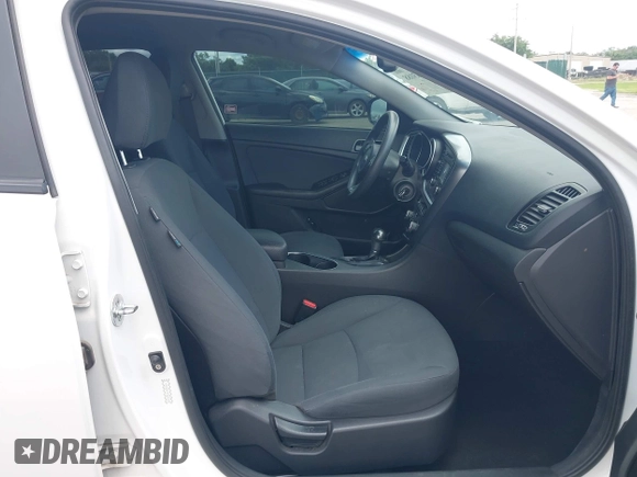 2015 Kia Optima LX with VIN KNAGM4A74F5653459, listed as a IAAI auction lot 42443188 with 109,129 mi miles and . Bid and sale history available at DreamBid. Image 5.