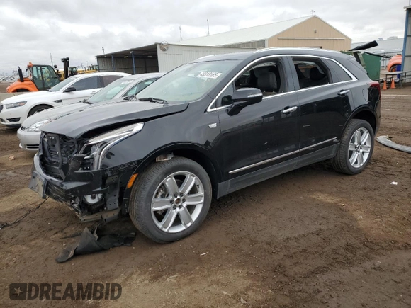 2021 Cadillac XT5 AWD Luxury z VIN 1GYKNBR4XMZ112957, wystawiony jako Copart lot #45513165 z przebiegiem 45 322 mil mil oraz Czysty tytuł • Clean title. Historia ofert i sprzedaży dostępna na DreamBid. Obrazek 1.